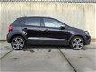 Volkswagen Polo - 1.2 TSI Cross NAV, LMV, airco, cruise control - 1 - Thumbnail