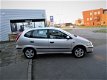 Nissan Almera Tino - 1.8 Tekna /mooie auto/achteruit camera/airco/navi/3e eigenaar/nap/nw apk - 1 - Thumbnail