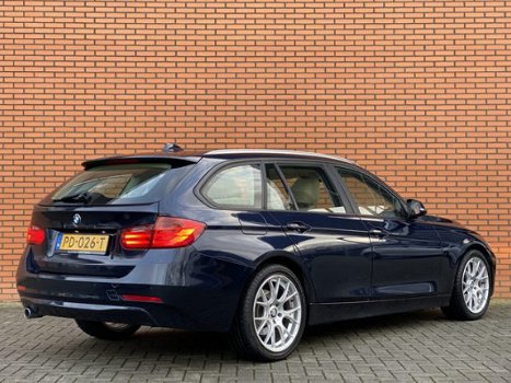 BMW 3-serie Touring - 318d High Executive | Panoramadak | Parkeersensoren | Keyless Go | Leer | Crui - 1