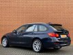 BMW 3-serie Touring - 318d High Executive | Panoramadak | Parkeersensoren | Keyless Go | Leer | Crui - 1 - Thumbnail