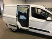 Ford Transit Courier - 1.6 TDCI 70KW/AIRCO/AUDIO/SCHUIFDEUR - 1 - Thumbnail