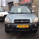 Hyundai Tucson - 2.0I CVVT DYNAMICVERSION 2WD - 1 - Thumbnail