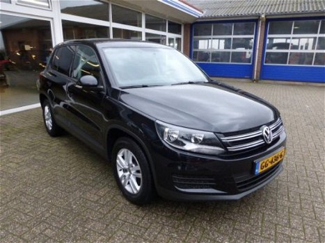 Volkswagen Tiguan - 1.4 TSI ComfortenDesign Edition % Drs SUV, LM, Stoelverw, Nav, Cl - 1