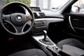 BMW 1-serie - 118I HIGH EXE. 5-DRS. AUT. NAVI SCH.DAK XENON - 1 - Thumbnail