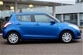 Suzuki Swift - 1.2 94pk 5-drs Summer | Airco | Stoelverwarming | 1e eigenaar - 1 - Thumbnail