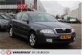 Skoda Octavia - 1.6 Ambiente LPG, airco, trekhaak, nap, onderhoud historie aanwezig - 1 - Thumbnail