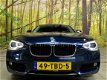 BMW 1-serie - 118i 170 PK Aut. Business 5-Deurs Navi Leer Xenon PDC 98.000 km - 1 - Thumbnail