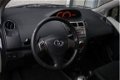 Toyota Yaris - 1.3 VVTi Aspiration AUTOMAAT (PDC/CLIMATE CONTROL/RADIO CD) - 1 - Thumbnail