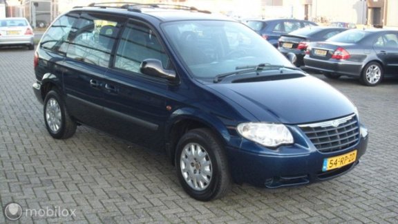 Chrysler Voyager - 2.4i SE Luxe 6 persoons, automaat, - 1