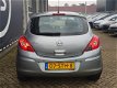 Opel Corsa - 1.4-16V Cosmo - AIRCO - CRUISECONTROLE - LM VELGEN - PARKEERSENSOREN ACHTER - 6 MAANDEN - 1 - Thumbnail