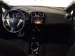 Nissan Note - 1.2 Black Edition/Airco/Navi/LM-Velgen/DAB/Zeer mooie uitrusting - 1 - Thumbnail