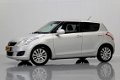 Suzuki Swift - 1.2 Exclusive, 5DRS | NW MODEL | CLIMA | CRUISE | STOELVERW | PDC - 1 - Thumbnail