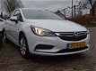 Opel Astra - 1.0 TURBO 105PK ONLINE EDITION + NAVI/ CAMERA/ AGR/ NL AUTO - 1 - Thumbnail