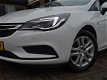 Opel Astra - 1.0 TURBO 105PK ONLINE EDITION + NAVI/ CAMERA/ AGR/ NL AUTO - 1 - Thumbnail