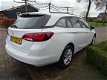 Opel Astra - 1.0 TURBO 105PK ONLINE EDITION + NAVI/ CAMERA/ AGR/ NL AUTO - 1 - Thumbnail