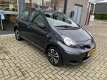 Toyota Aygo - 1.0-12V Comfort | 5-deurs | Airco | Weinig KM's | Donkergrijs Metallic - 1 - Thumbnail