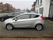 Ford Fiesta - 1.25 Ghia 54.000 KM, Climate control, Cruise control, L.M.Velgen, Parkeersensoren, Rad - 1 - Thumbnail