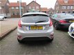 Ford Fiesta - 1.25 Ghia 54.000 KM, Climate control, Cruise control, L.M.Velgen, Parkeersensoren, Rad - 1 - Thumbnail