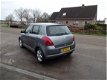 Suzuki Swift - 1.3 GA 5-drs / Leder / Rijklaarprijs - 1 - Thumbnail