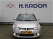 Suzuki Swift - 1.3 Limited - airco en trekhaak - 1 - Thumbnail