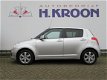 Suzuki Swift - 1.3 Limited - airco en trekhaak - 1 - Thumbnail