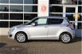 Suzuki Swift - 1.2 | Exclusive | Clima | Cruise | Keyless Entry | Bluetooth - 1 - Thumbnail