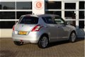 Suzuki Swift - 1.2 | Exclusive | Clima | Cruise | Keyless Entry | Bluetooth - 1 - Thumbnail