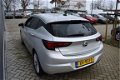 Opel Astra - 1.0 Turbo 120 Jaar Edition NAVI / RIJKLAARPRIJS ecc airco / pdc / agr-stoelen / 17 inch - 1 - Thumbnail