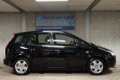 Ford Focus C-Max - 2.0-16V Futura ECC, 2 x PDC, cruise, trekhaak - 1 - Thumbnail