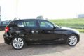 BMW 1-serie - 116i Business Sport 17 INCH SPORTVELGEN 5 DEURS 6-BAK - 1 - Thumbnail