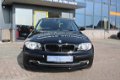 BMW 1-serie - 116i Business Sport 17 INCH SPORTVELGEN 5 DEURS 6-BAK - 1 - Thumbnail