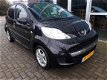 Peugeot 107 - AIRCO. NAVI. LEER. LUXE 143 dkm (2011) - 1 - Thumbnail