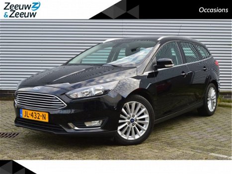 Ford Focus Wagon - 1.0 Titanium *Nette auto* Navi* Trekhaak* Zeer compleet* Zeeuw & Zeeuw Alphen a/d - 1