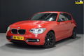 BMW 1-serie - 118i Sport Limited M-Pakket 170 PK [M-PAKKET, GROOT NAVI, SPORTSTOELEN, TELEFOON, BLUE - 1 - Thumbnail