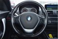 BMW 1-serie - 118i Sport Line Black Edition 170 PK [GROOT NAVI, SPORTLINE, RODE STIKSELS, PDC, CRUIS - 1 - Thumbnail