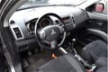 Mitsubishi Outlander - 2.4 Intro Edition 2WD Clima/NAP/Cruise/Trekhaak - 1 - Thumbnail