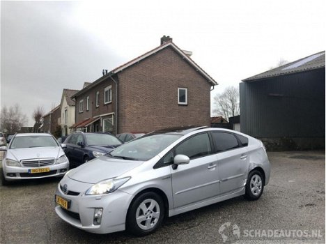 Toyota Prius - 1.8 hybride aut pano - premium - solardak - leer - nav - camera - bi xenon - head up - 1