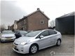 Toyota Prius - 1.8 hybride aut pano - premium - solardak - leer - nav - camera - bi xenon - head up - 1 - Thumbnail