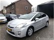 Toyota Prius - 1.8 hybride aut pano - premium - solardak - leer - nav - camera - bi xenon - head up - 1 - Thumbnail