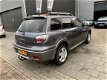 Mitsubishi Outlander - 2.4 Intense 4WD Paris Pack Trehaak Airco NAP APK 1 Jaar - 1 - Thumbnail