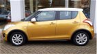 Suzuki Swift - 1.2 DYNAMIC EASSS Stoelverwarming | Airco | Cruise - 1 - Thumbnail