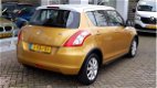 Suzuki Swift - 1.2 DYNAMIC EASSS Stoelverwarming | Airco | Cruise - 1 - Thumbnail