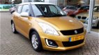 Suzuki Swift - 1.2 DYNAMIC EASSS Stoelverwarming | Airco | Cruise - 1 - Thumbnail