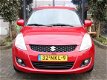 Suzuki Swift - 1.2 Exclusive 5-DRS TREKHAAK CLIMA CRUISE CONTROL - 1 - Thumbnail