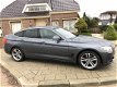 BMW 3-serie Gran Turismo - 320i High Executive sport garantie* 6 maanden - 1 - Thumbnail