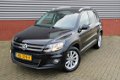 Volkswagen Tiguan - 1.4 TSI Sport&Style 150 PK Navi Cruise Park Assist El-wegklapbare Trekhaak Stoel - 1 - Thumbnail