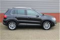 Volkswagen Tiguan - 1.4 TSI Sport&Style 150 PK Navi Cruise Park Assist El-wegklapbare Trekhaak Stoel - 1 - Thumbnail