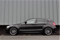 BMW 1-serie - 2.0 118i E87 Facelift | Automaat | 5 deurs | Sportstoelen - 1 - Thumbnail