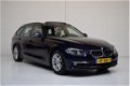 BMW 3-serie Touring - 320d High Executive 190PK AUT8 M SPORT PANORAMADAK/EURO6/HEAD-up/HARMAN-KARDON - 1 - Thumbnail