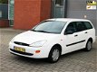 Ford Focus Wagon - 1.4-16V Ambiente - 1 - Thumbnail